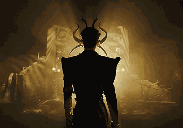 a man with horns on his head stands in front of a building