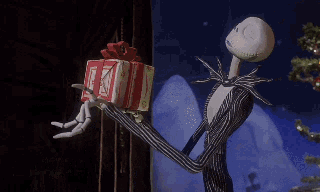 The Nightmare Before Christmas Jack Skellington GIF - The Nightmare Before Christmas Jack Skellington Present GIFs
