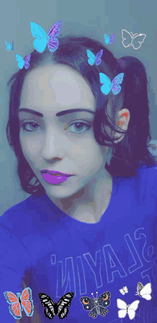a girl wearing a blue shirt with the word miya on it