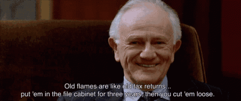 a man in a suit and tie says old flames are like old tax returns put em in the file cabinet for three years