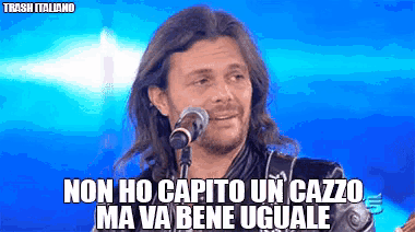 a man singing into a microphone with the words non ho capita un cazzo ma va bene uguale