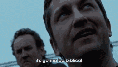 two men are standing next to each other and one of them is talking about being biblical .