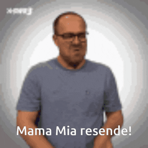 a man wearing glasses and a blue shirt says mama mia resende