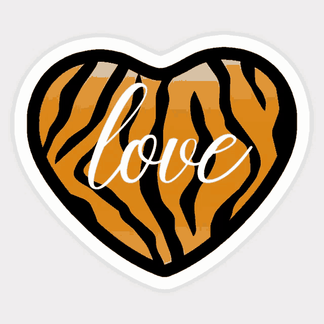 a heart with a tiger print and the word love written on it