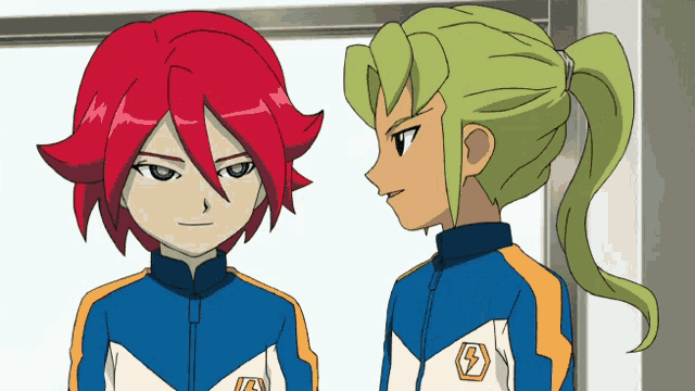 two anime characters one with red hair and one with green hair