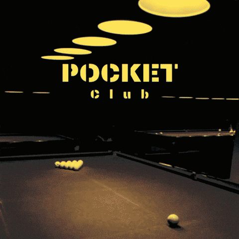 a pool table in front of a sign that says " pocket club "
