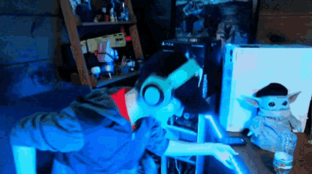 a man wearing headphones is playing a video game