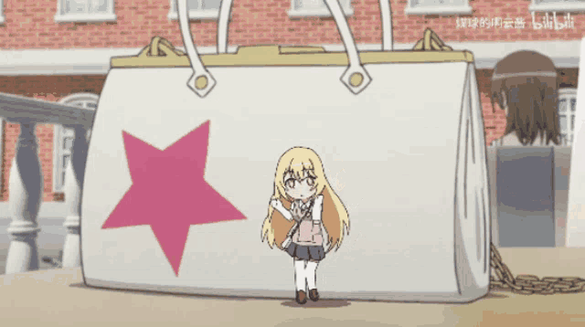 a girl is standing in front of a large purse with a pink star on it