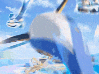 a close up of a dolphin 's head with a blue sky in the background