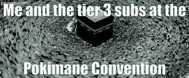 a black and white photo of a kaaba in the middle of a body of water .