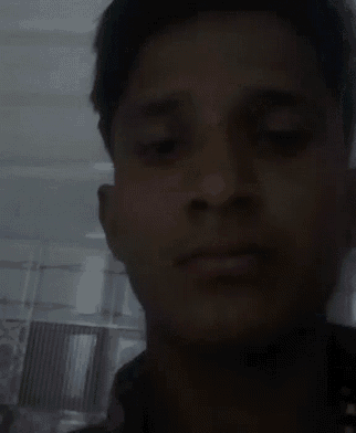 a close up of a man 's face with a serious look on his face