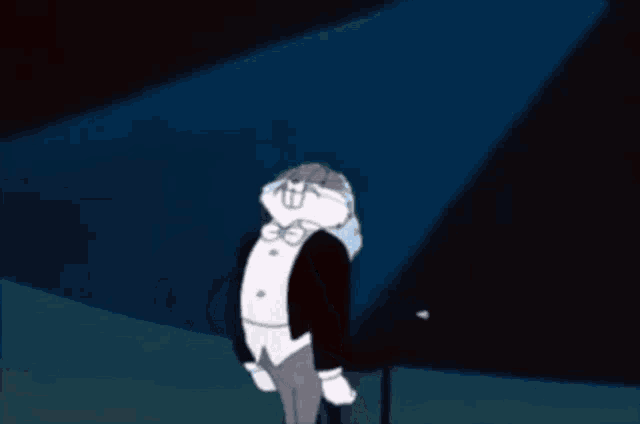 a cartoon character in a tuxedo is clapping his hands in the air