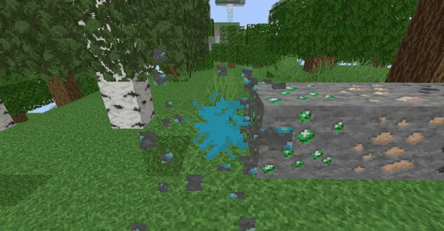 a screenshot of a minecraft game shows a tree and a block of dirt