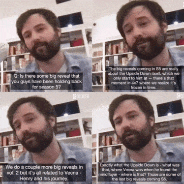 a man with a beard is talking in front of a bookshelf