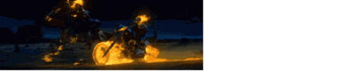 a ghost rider is riding a motorcycle on fire