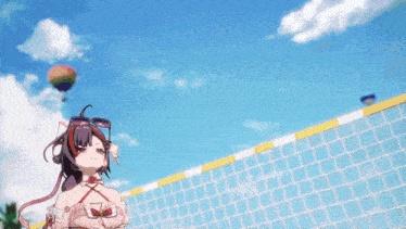 a girl is standing in front of a volleyball net with balloons in the background