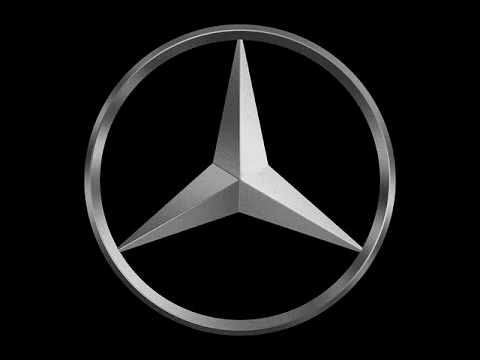 the mercedes benz logo is on a black background .