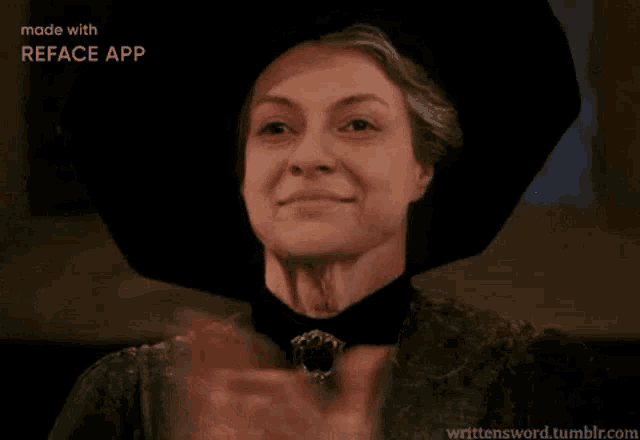 a woman in a black hat is clapping her hands and smiling .