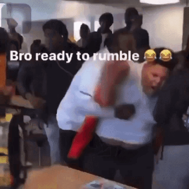 a group of people are dancing in a room with the words `` bro ready to rumble '' above them .