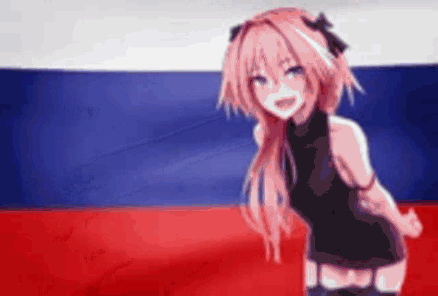 a girl with pink hair is standing in front of a flag .