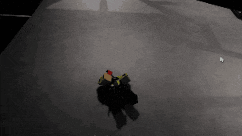 a person in a video game is laying on the ground with a cursor pointing at them