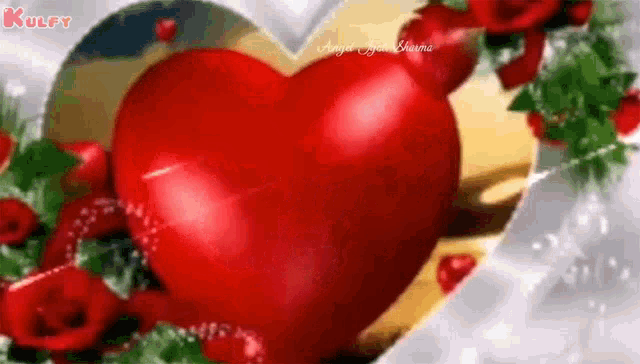 a red heart is surrounded by red roses and leaves on a white surface .