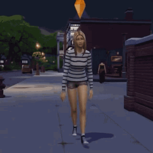 a woman in a striped shirt and shorts walks down a sidewalk
