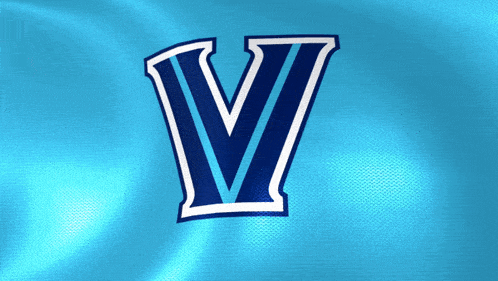 a blue and white letter v on a blue cloth