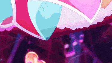 a girl in a pink dress is dancing in a dark room
