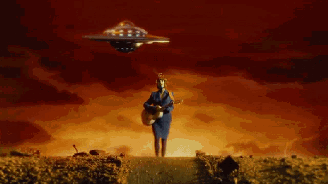 a woman playing a guitar in front of an ufo in the sky