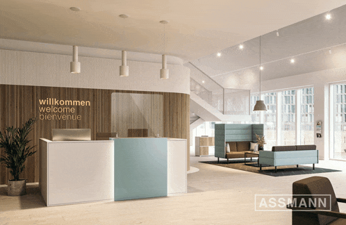 a reception area with the words willkommen welcome bienvenue on the wall