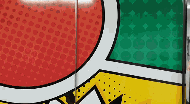 a close up of a wall with a comic book bubble on it