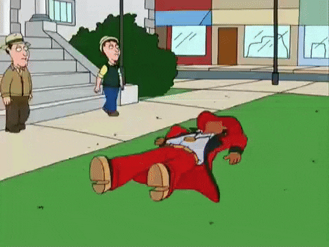 a man in a red suit is laying on the grass in a cartoon