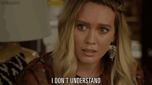 a close up of a woman 's face with the words `` i don 't understand '' written on the bottom .