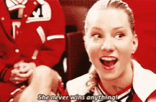 a cheerleader is saying she never wins anything .