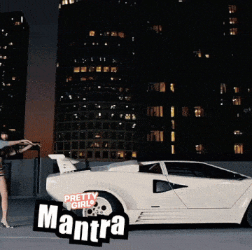a pretty girls mantra ad with a white car