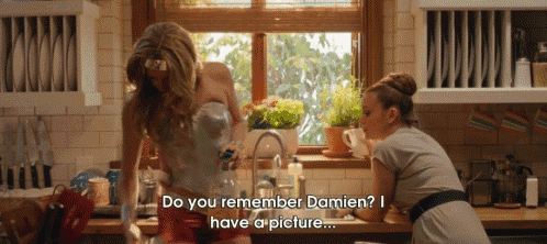 two women in a kitchen with the words do you remember damien