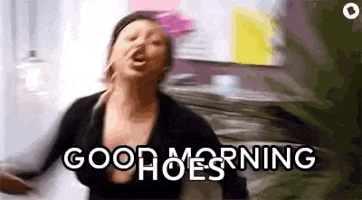 a woman is screaming and saying `` good morning '' in a room .