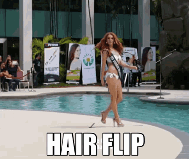 a woman in a bikini is walking by a pool with the words hair flip below her