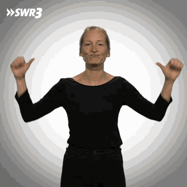 a woman is giving a thumbs up with a swr3 logo in the background
