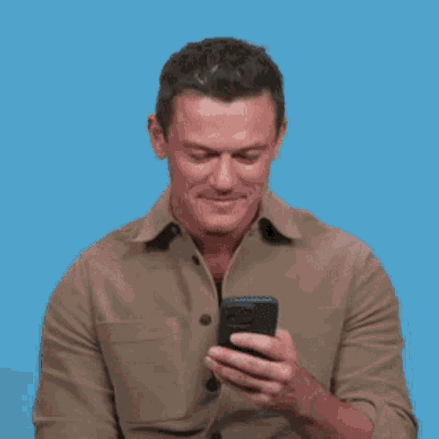 Luke Evans Reading GIF - Luke Evans Reading Thirst Tweets GIFs