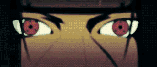 a close up of a person 's eyes with red eyes and a black background .