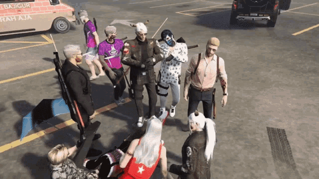 a group of people are standing in a parking lot in front of a van that says bajigun raha aja