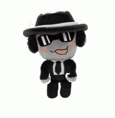 a stuffed animal with a hat and sunglasses on
