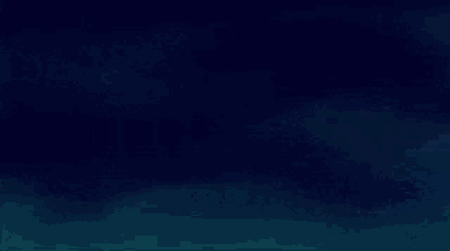 a cartoon character is flying through the air in a dark room