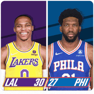 two basketball players one from the lakers and one from the philadelphia phillies