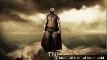 a gif of a man standing on a rock with the words this make gifs at gifsoup.com at the bottom