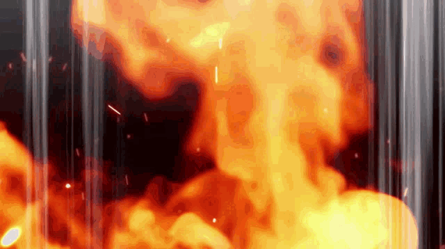 a close up of a fire explosion with a black background
