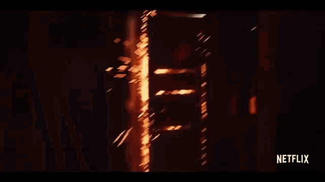 a netflix ad shows a person being thrown into a fire .
