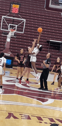 a basketball game is underway with a score of 30 to 0